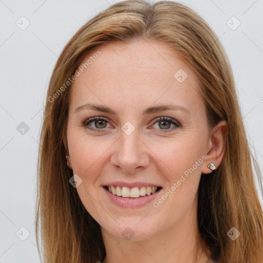 Joyful white young-adult female with long  brown hair and brown eyes