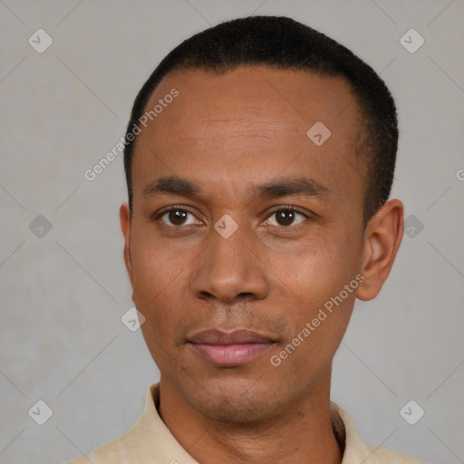 Neutral latino young-adult male with short  black hair and brown eyes