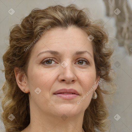 Joyful white adult female with medium  brown hair and green eyes