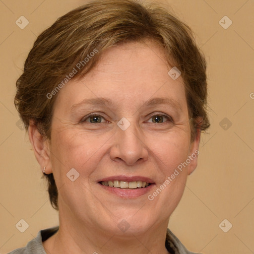 Joyful white adult female with short  brown hair and brown eyes