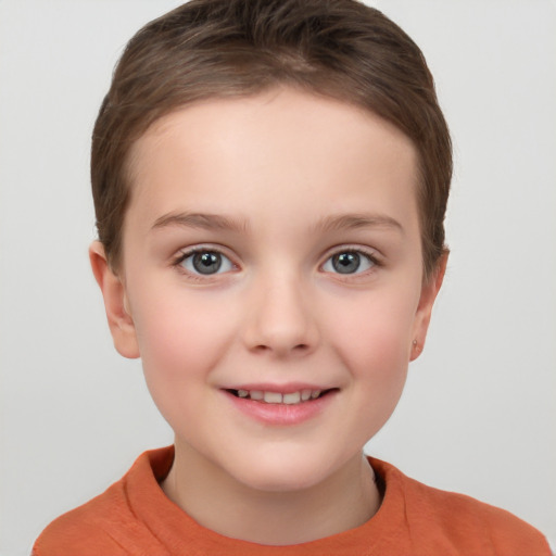 Joyful white child female with short  brown hair and grey eyes