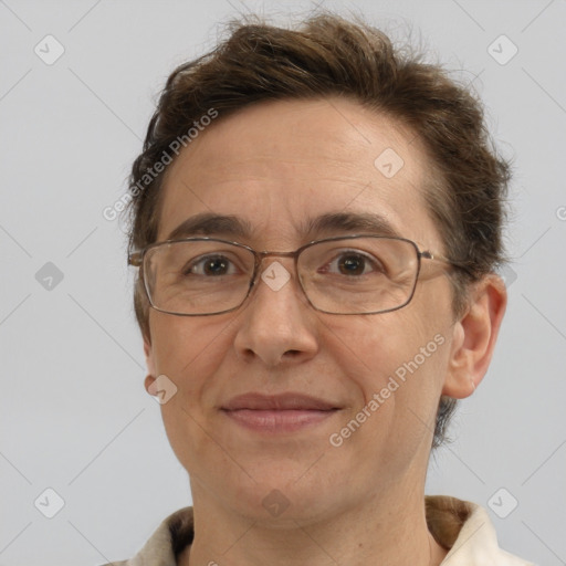 Joyful white middle-aged male with short  brown hair and brown eyes