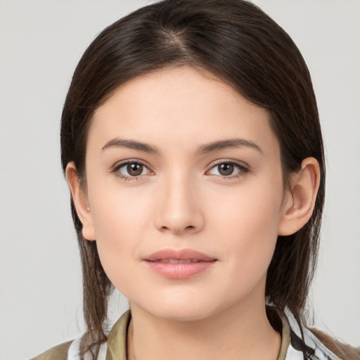 Neutral white young-adult female with medium  brown hair and brown eyes