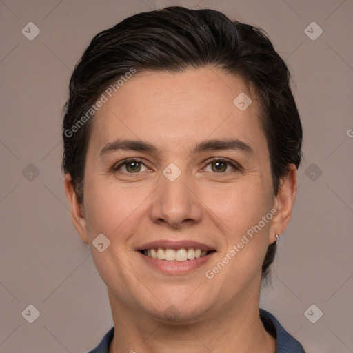 Joyful white adult female with short  brown hair and brown eyes