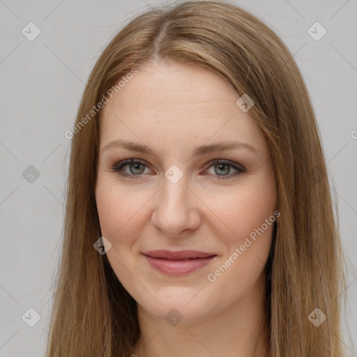 Joyful white young-adult female with long  brown hair and grey eyes