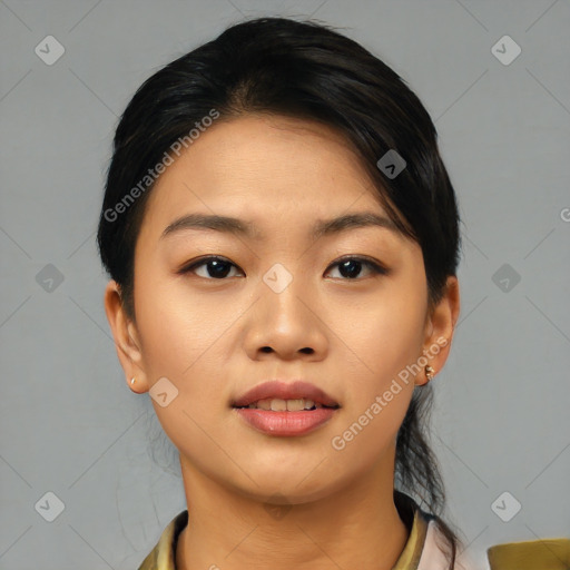 Joyful asian young-adult female with medium  black hair and brown eyes