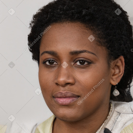 Neutral black young-adult female with short  black hair and brown eyes