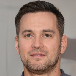 Neutral white adult male with short  brown hair and brown eyes