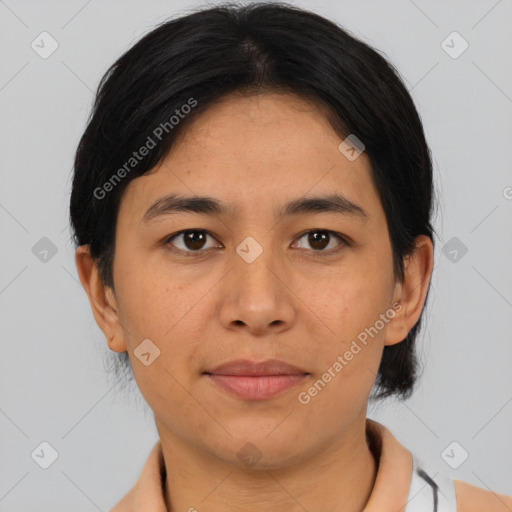 Joyful asian young-adult female with short  black hair and brown eyes