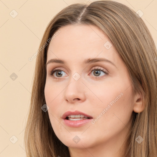 Neutral white young-adult female with long  brown hair and brown eyes