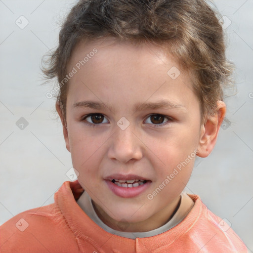 Joyful white child male with short  brown hair and brown eyes