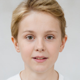 Joyful white child female with short  brown hair and brown eyes