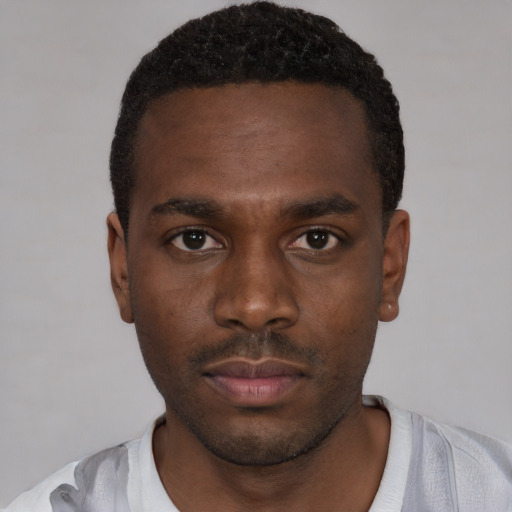 Neutral black young-adult male with short  brown hair and brown eyes