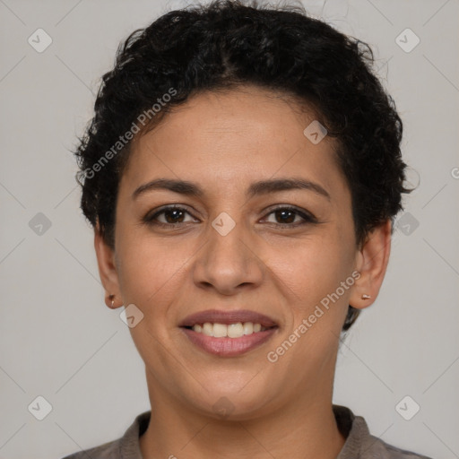 Joyful latino young-adult female with short  brown hair and brown eyes