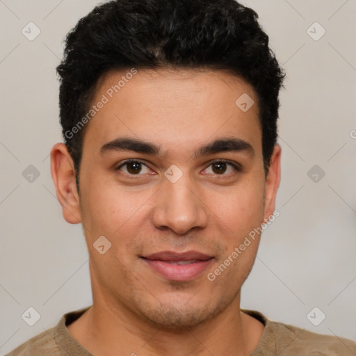 Joyful latino young-adult male with short  brown hair and brown eyes