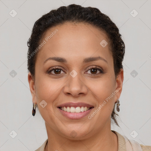 Joyful latino young-adult female with short  brown hair and brown eyes