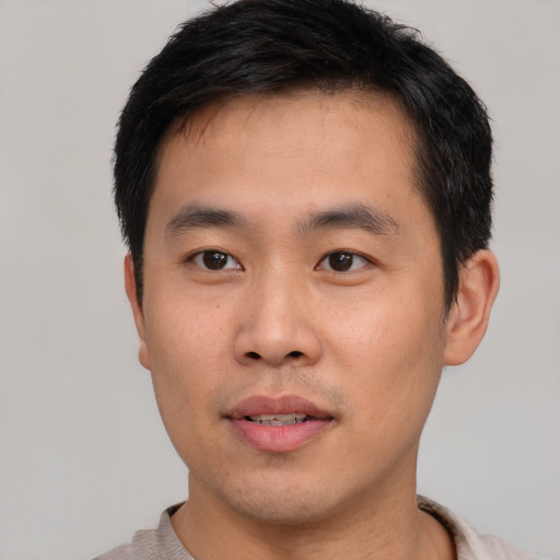 Neutral asian young-adult male with short  black hair and brown eyes