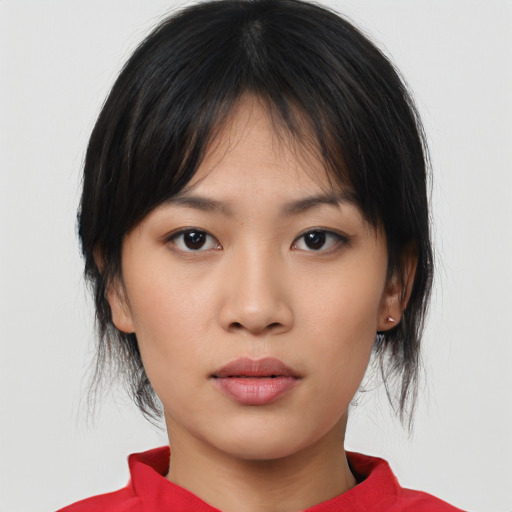 Neutral asian young-adult female with medium  black hair and brown eyes