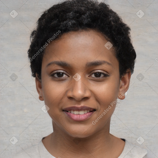 Joyful black young-adult female with short  black hair and brown eyes