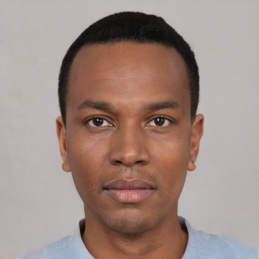 Neutral black young-adult male with short  black hair and brown eyes