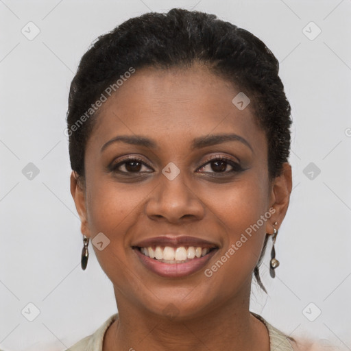 Joyful black young-adult female with short  brown hair and brown eyes