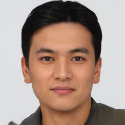 Neutral asian young-adult male with short  black hair and brown eyes