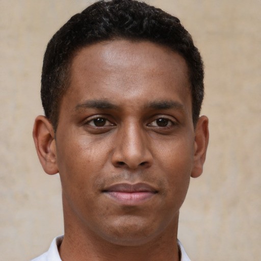 Neutral black young-adult male with short  brown hair and brown eyes