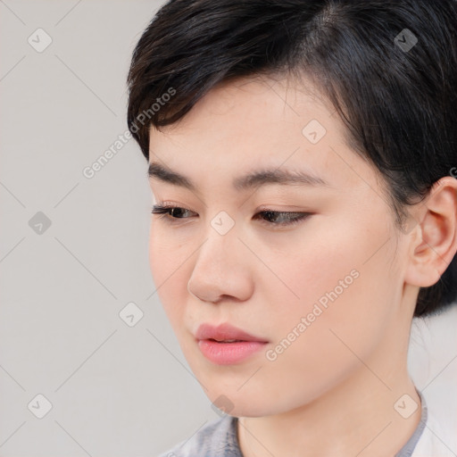 Neutral white young-adult female with medium  brown hair and brown eyes