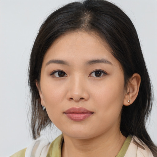 Neutral asian young-adult female with medium  brown hair and brown eyes