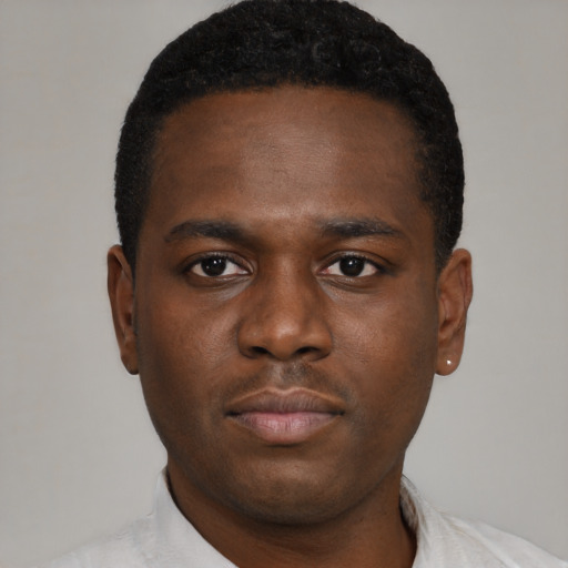 Neutral black young-adult male with short  brown hair and brown eyes
