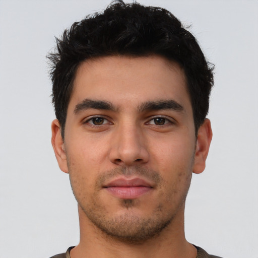 Neutral latino young-adult male with short  brown hair and brown eyes