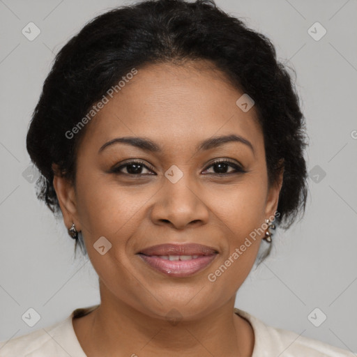 Joyful latino adult female with medium  brown hair and brown eyes