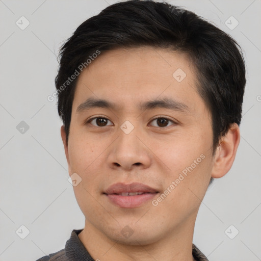 Joyful asian young-adult male with short  brown hair and brown eyes