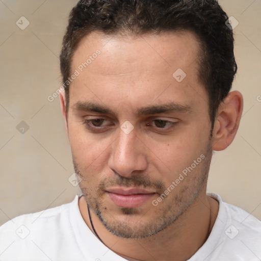 Neutral white young-adult male with short  brown hair and brown eyes