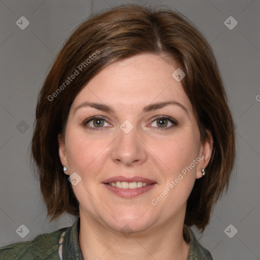 Joyful white adult female with medium  brown hair and brown eyes