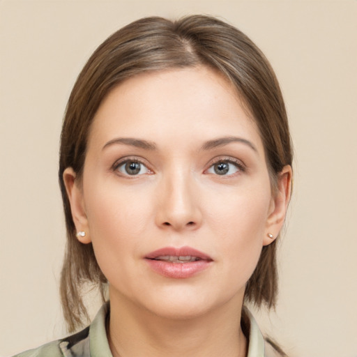 Neutral white young-adult female with medium  brown hair and grey eyes