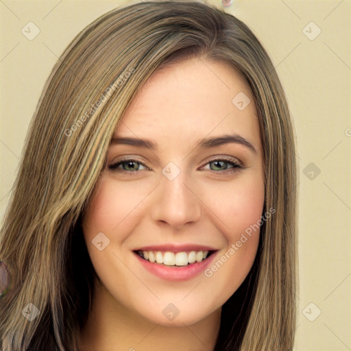 Joyful white young-adult female with long  brown hair and green eyes