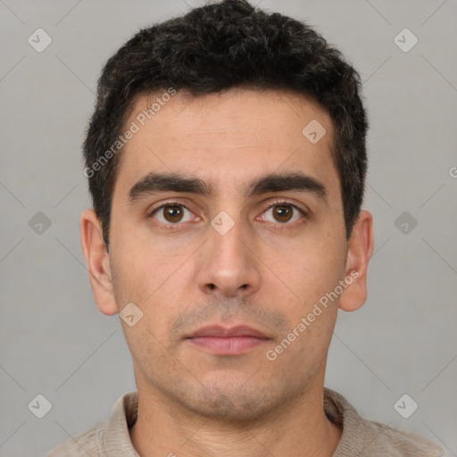 Neutral white young-adult male with short  brown hair and brown eyes