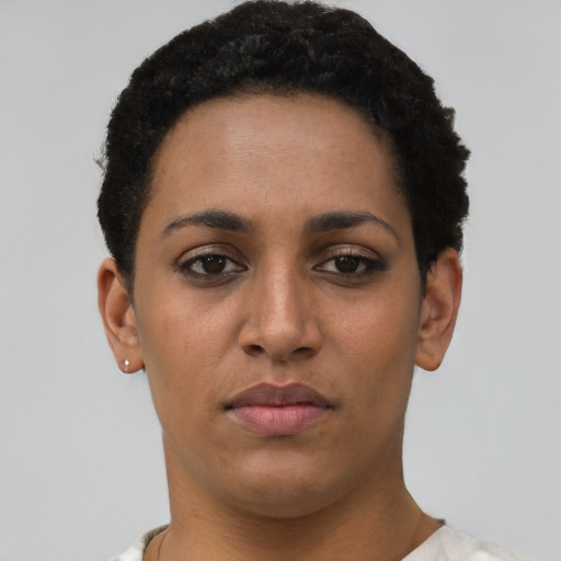 Neutral latino young-adult female with short  black hair and brown eyes