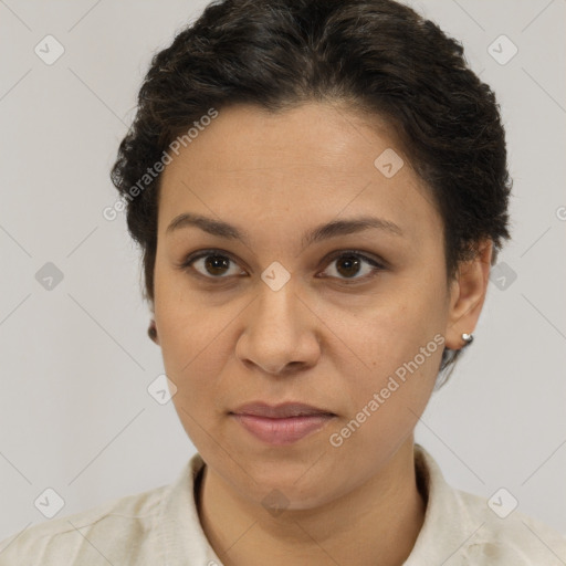 Joyful white adult female with short  brown hair and brown eyes