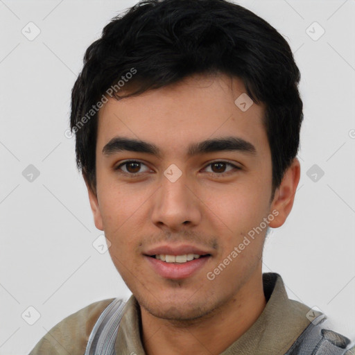 Joyful asian young-adult male with short  black hair and brown eyes