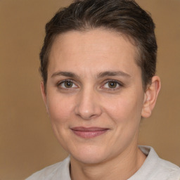 Joyful white adult female with short  brown hair and brown eyes