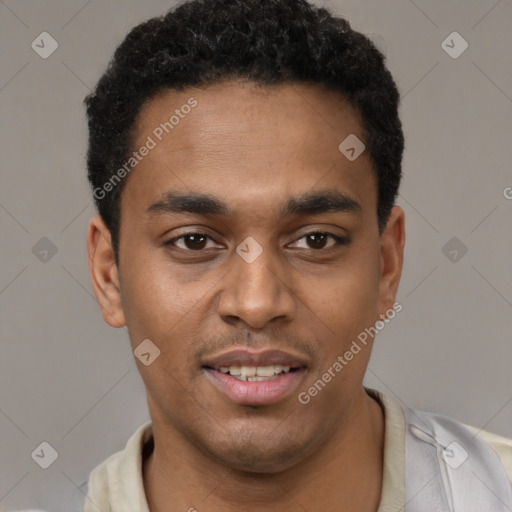 Joyful black young-adult male with short  brown hair and brown eyes