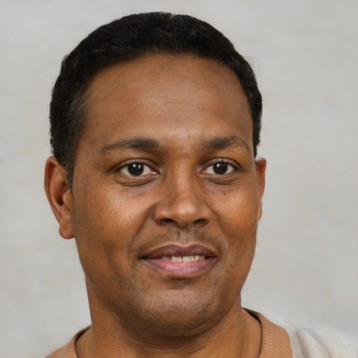 Neutral black young-adult male with short  brown hair and brown eyes