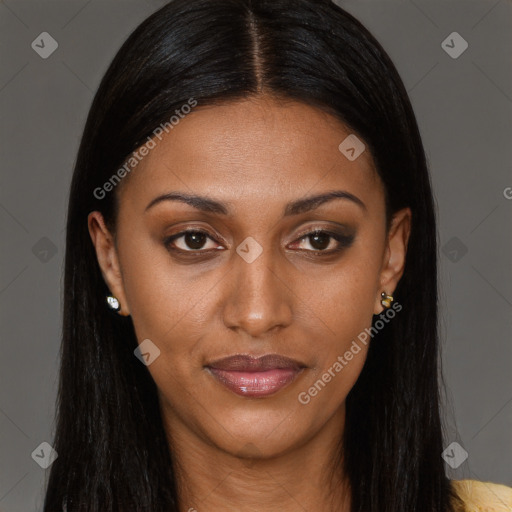 Joyful black young-adult female with long  brown hair and brown eyes