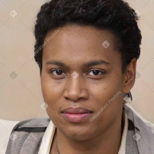 Joyful black young-adult male with short  brown hair and brown eyes