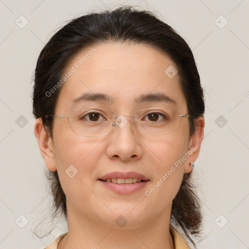 Joyful white adult female with medium  brown hair and brown eyes