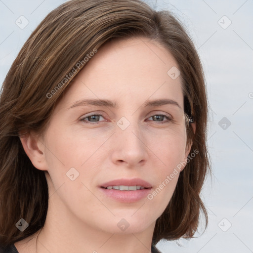 Joyful white young-adult female with medium  brown hair and blue eyes