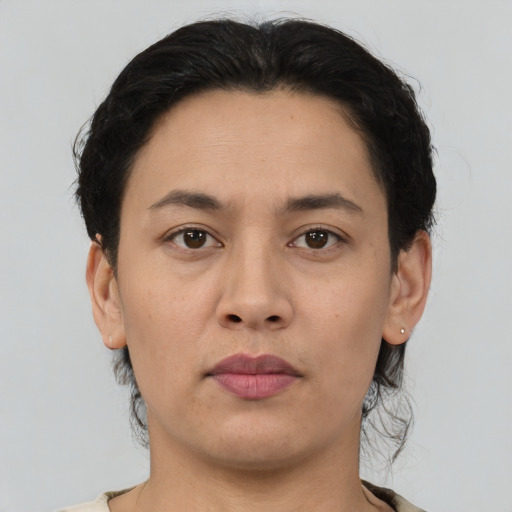 Neutral asian young-adult female with short  brown hair and brown eyes