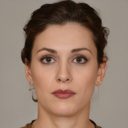 Neutral white young-adult female with short  brown hair and brown eyes